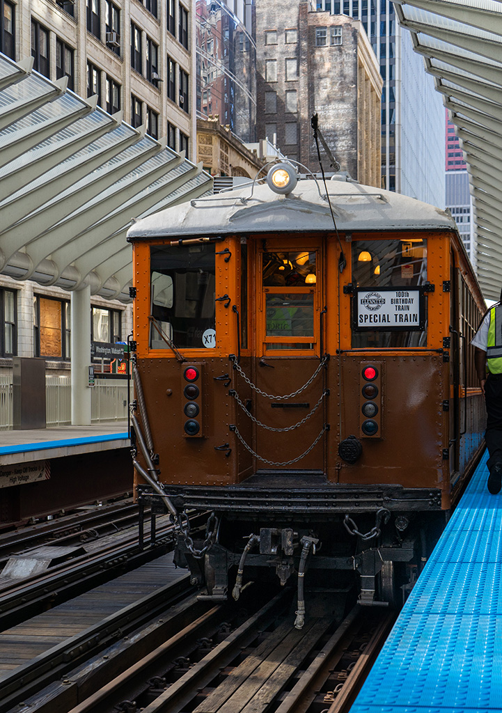 The back of 4271 of the 4000-Series. There is a sign in the back window that says "100th Birthday Train. Special Train"